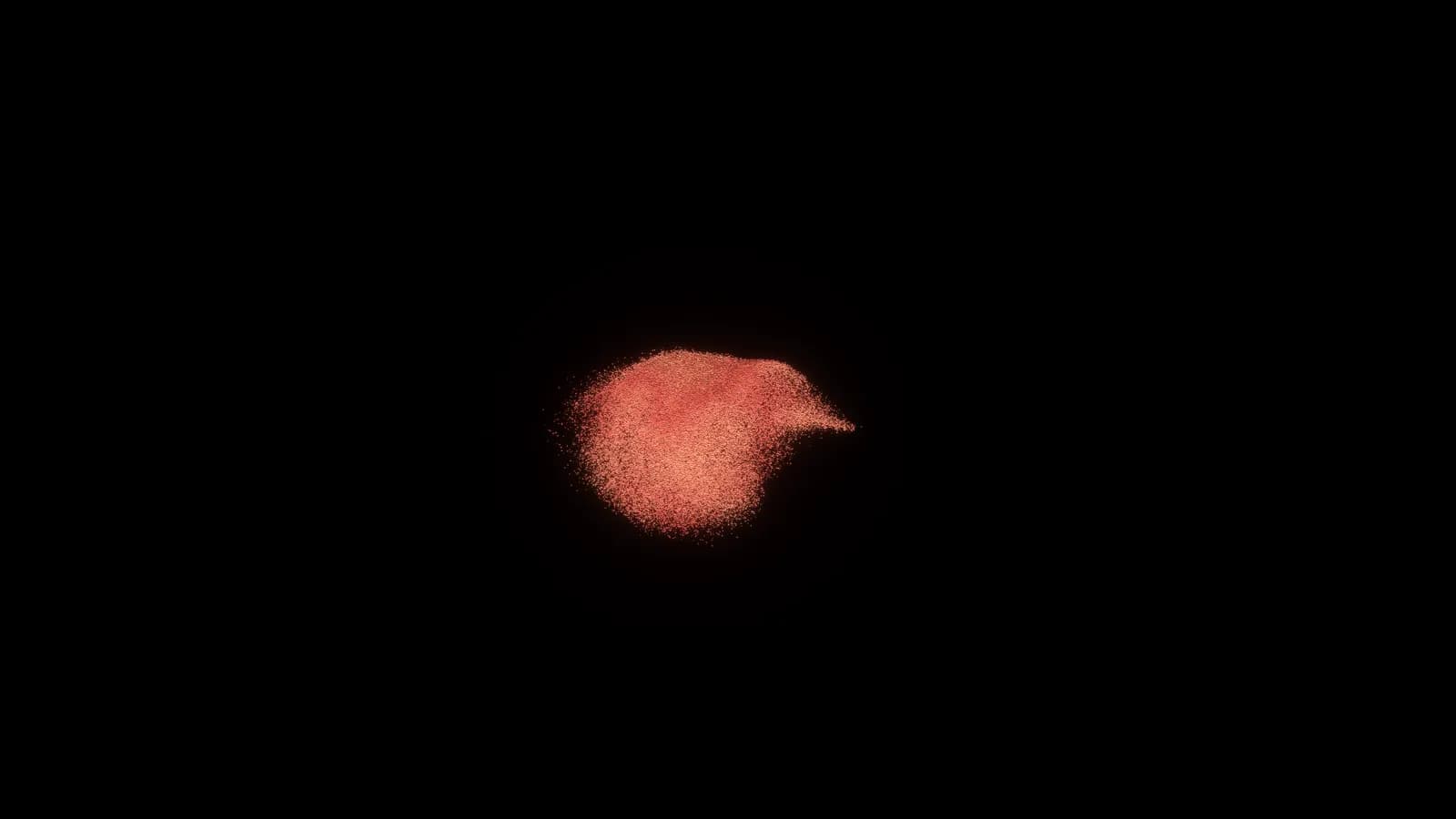 Render of red sand arriving from visitors, assembling the Pixel Studio wordmark, then dissolving to black