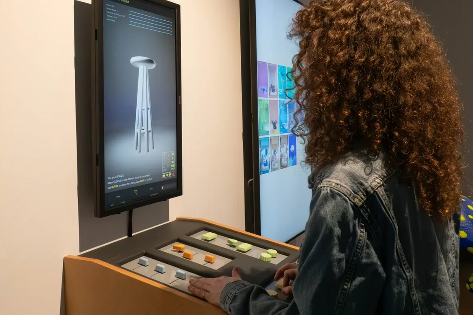 A visitor at the console with the interface reading Build Your Object, You are in STAGE 1